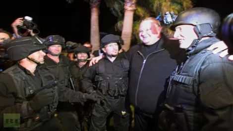 Megaupload kim dotcom poseswith